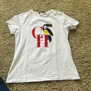 Carolina Herrera white stretch top, embroidered CH/TUCAN